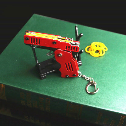 Mini Folding Rubber Band Gun Toy Keychain 6