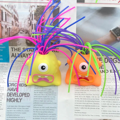 Funny Hair-Pulling Screaming Monster Toy 7